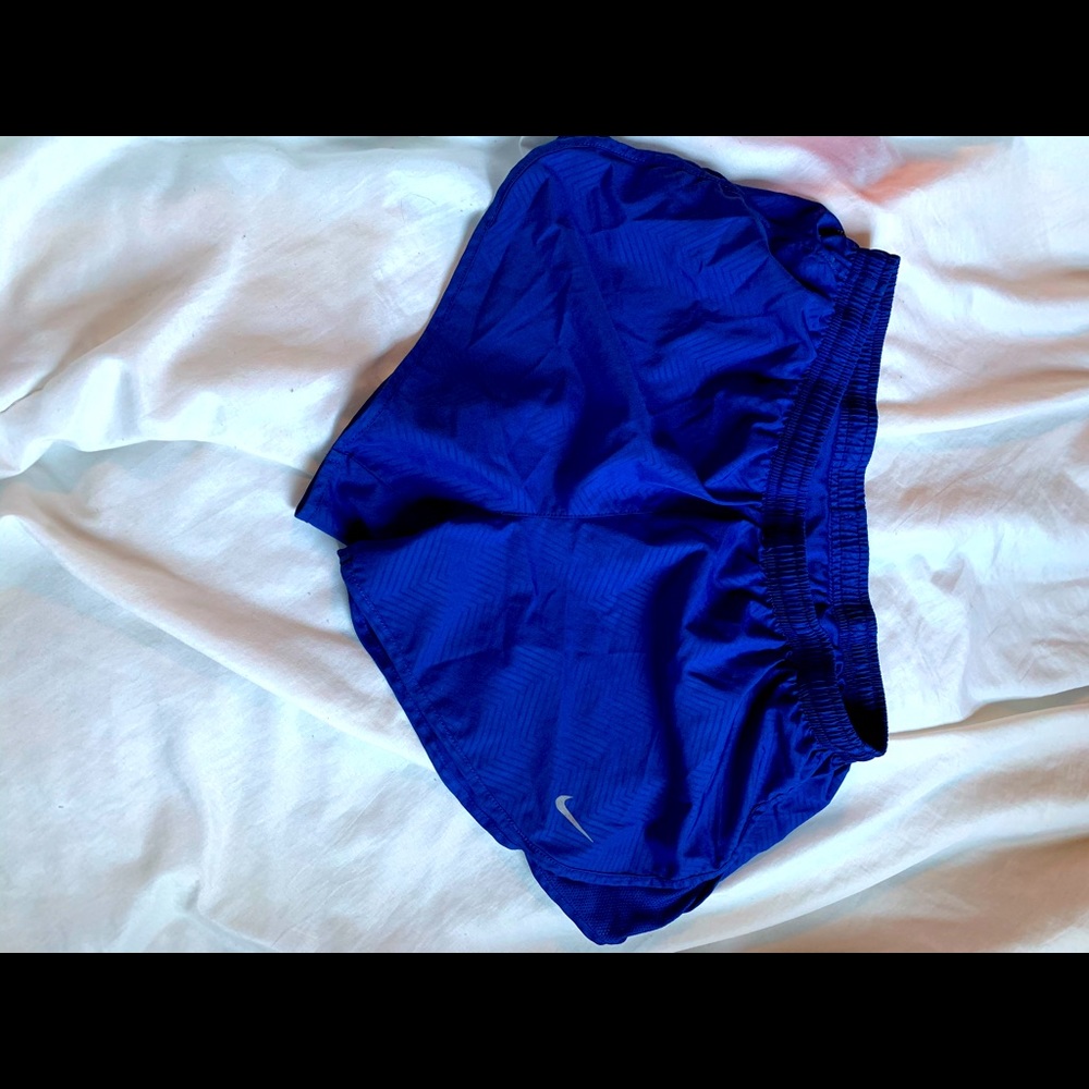Blue nike running shorts